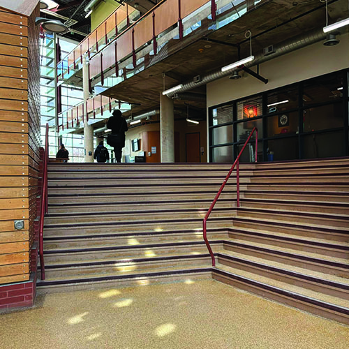 The S wing building is has a lot of echo and students talking. Footsteps especially sound interesting in the area.