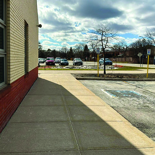 The back of campus is quieter than the front and I wanted to record the sounds of the wind and cars driving by.